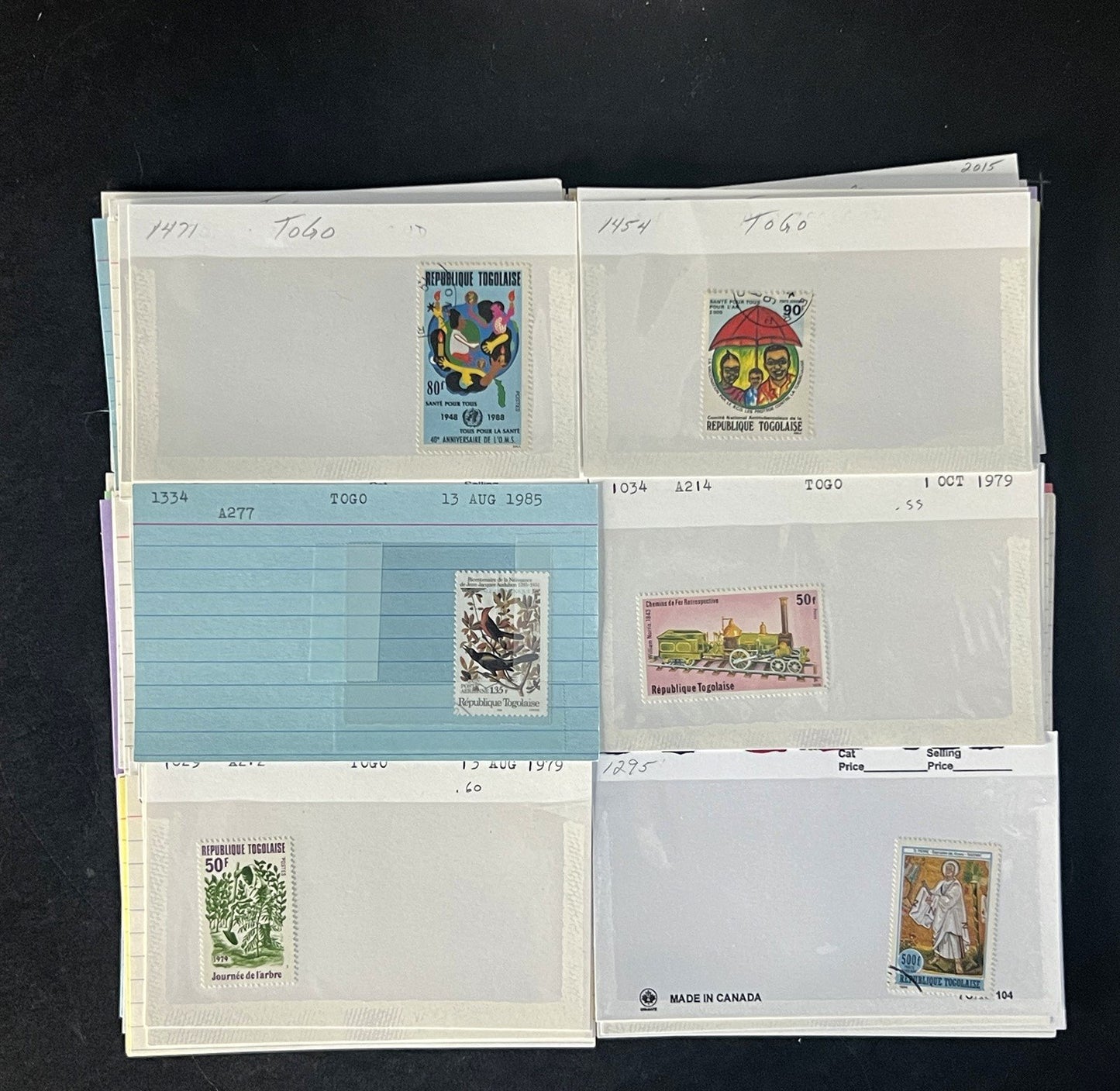 Togo Stamp Collection Dealer Cards $83 CV Mint & Used ZAYIX