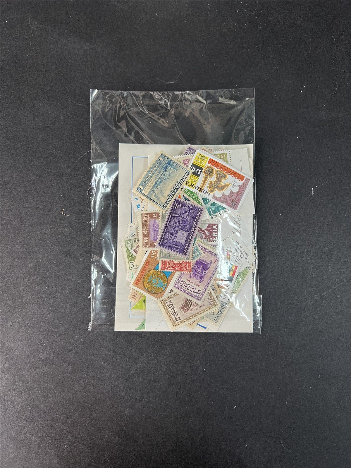 Mint Worldwide Stamp Mixture Unchecked Off Paper Lot Kiloware 1 oz/28g ZAYIX