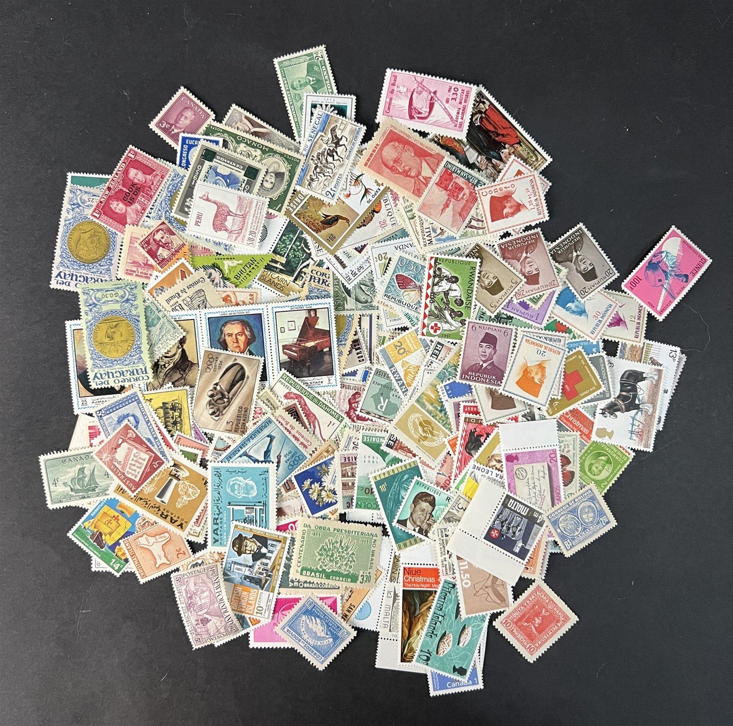 Mint Worldwide Stamp Mixture Unchecked Off Paper Lot Kiloware 1 oz/28g ZAYIX